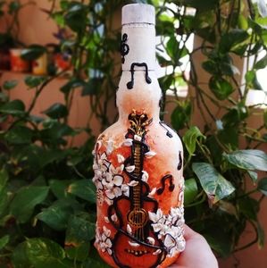 Bottle art piece for music and guitar lovers
